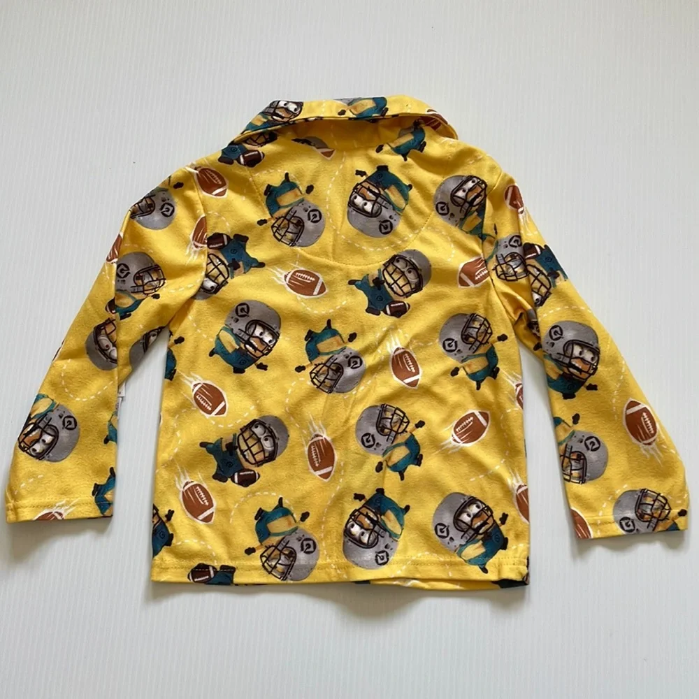 Minions yellow football pajama top & bottoms.  Size 4